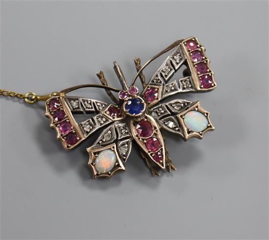 A Victorian yellow metal and multi gem set bug brooch, 40mm.